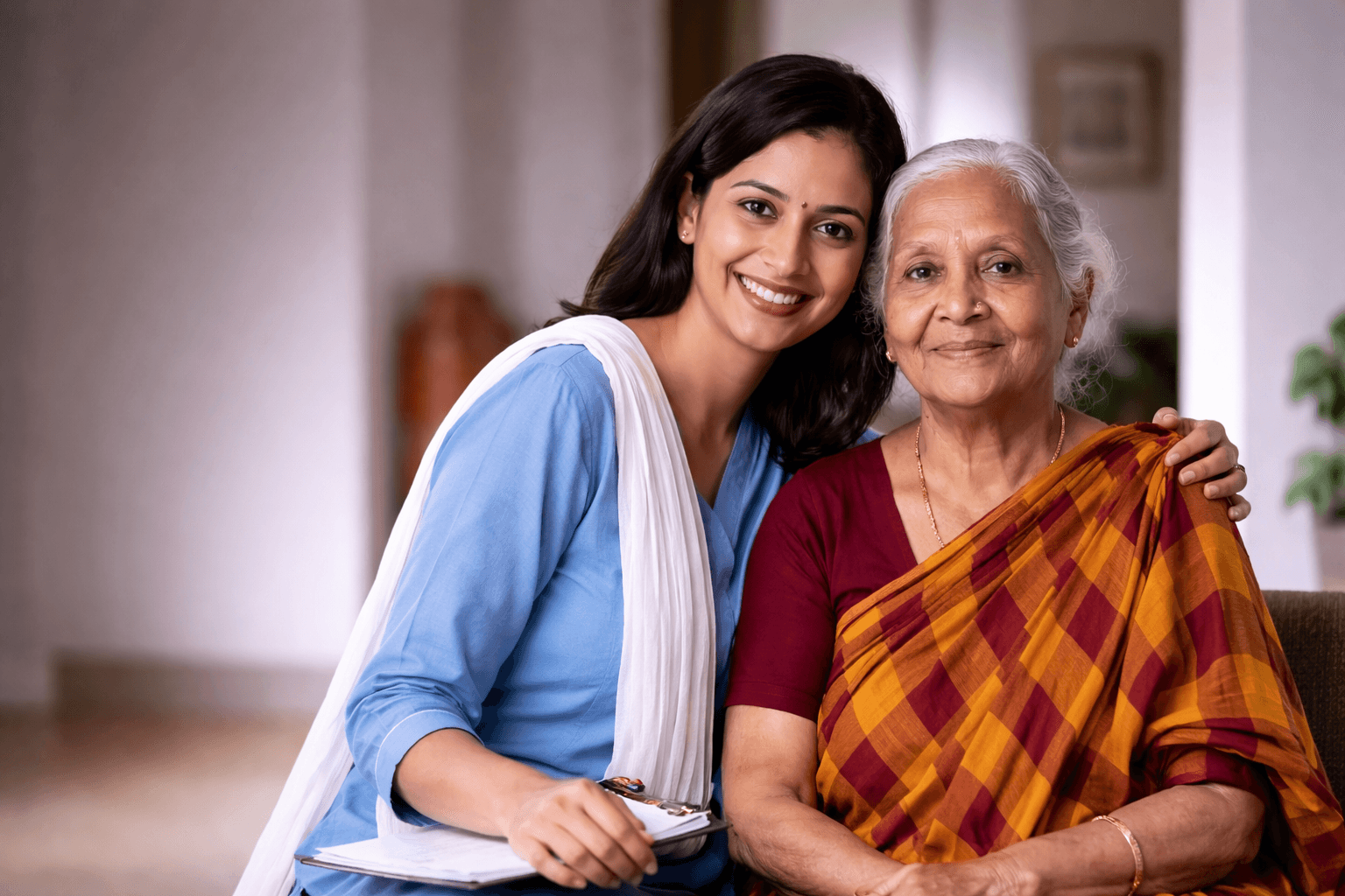 Kareverse Care Manager with an elderly parent at home in Bangalore
